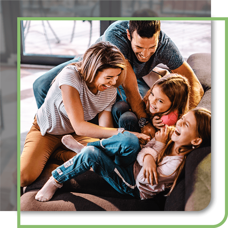 Family playing on the couch